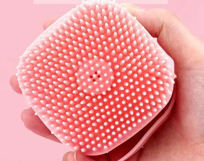 Scalp massage brush shown from above