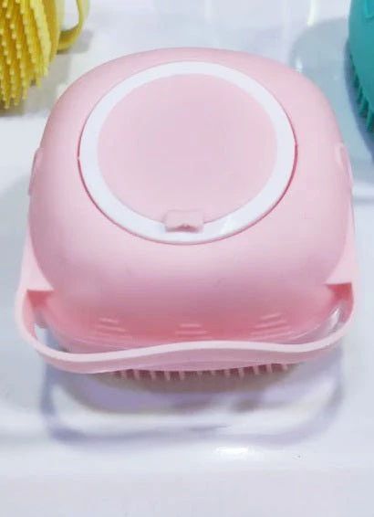 Scalp brush held comfortably in a wet hand