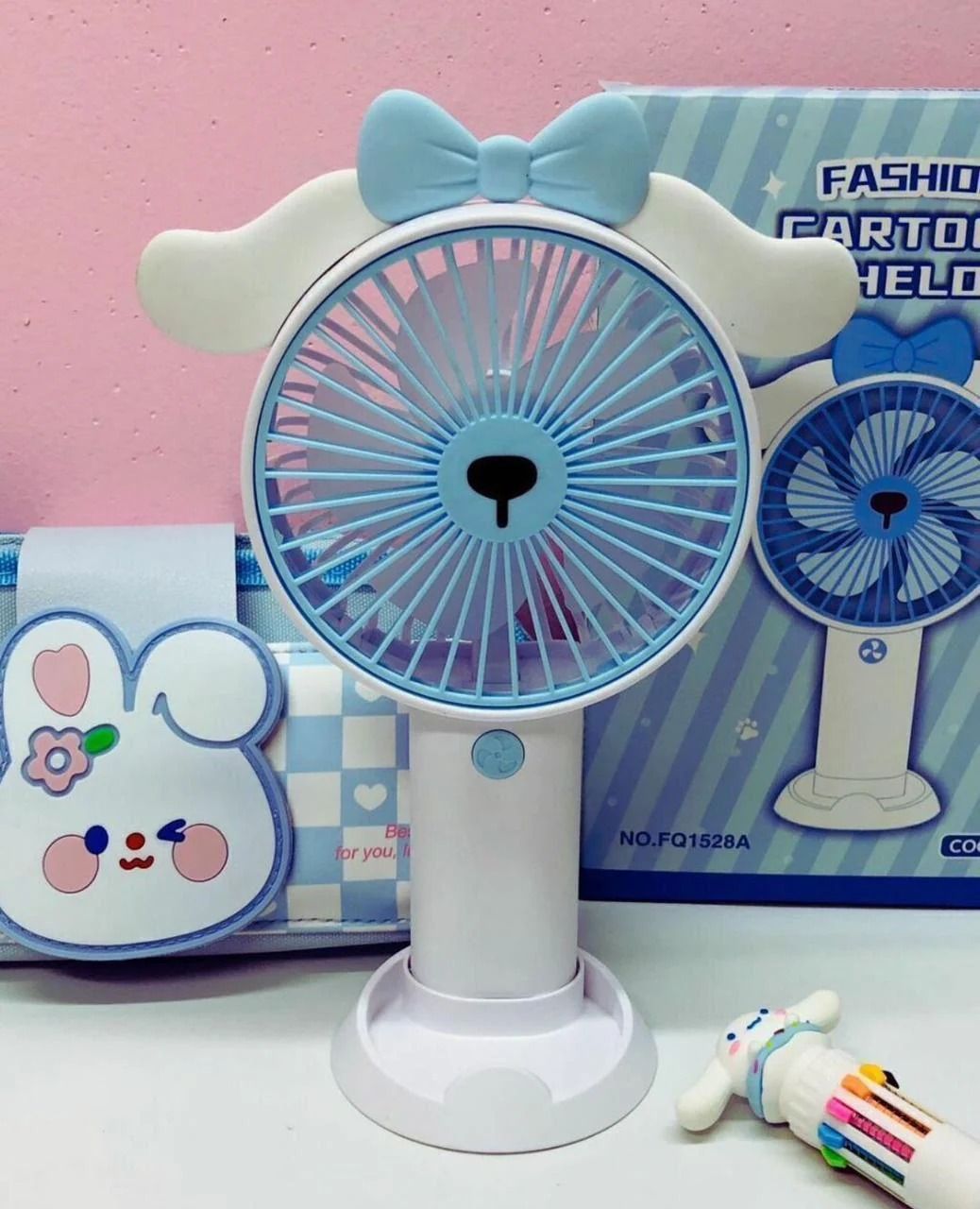 Handheld fan packed into a bag