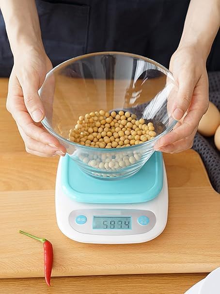Weighing flour in grams for baking