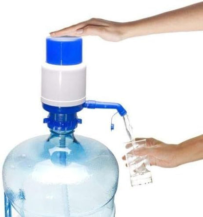 Hand press manual water pump on a bottle