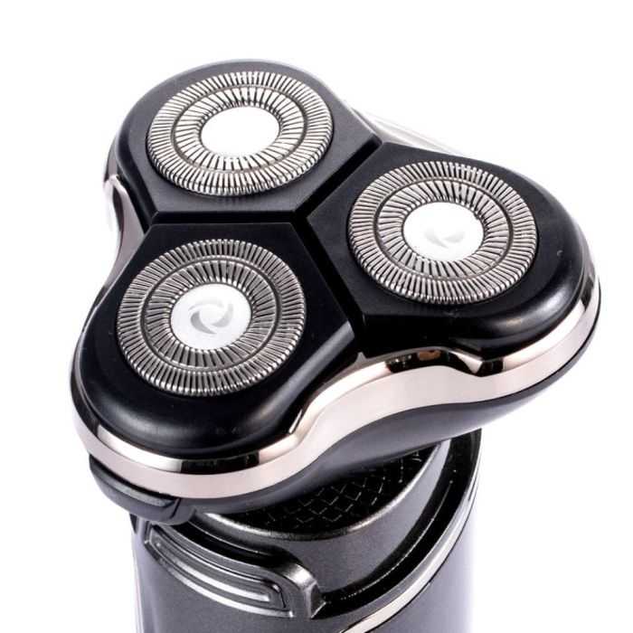Electric shaver shown with its attachments