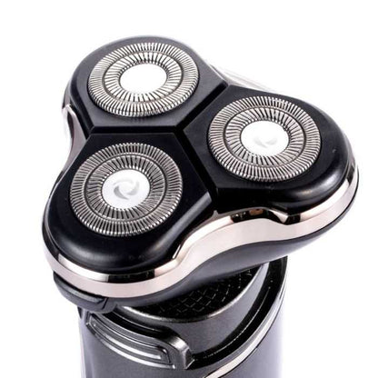 Electric shaver shown with its attachments