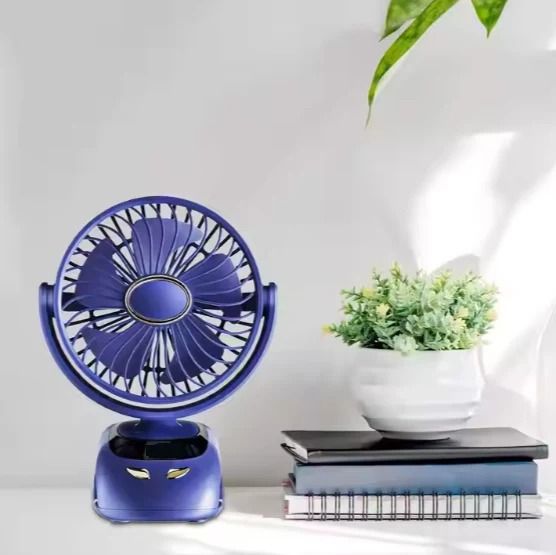Quiet mini fan running on a desk