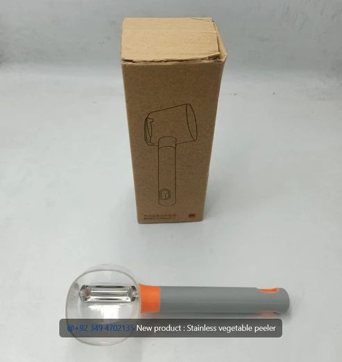 Wide blade vegetable peeler with catch container